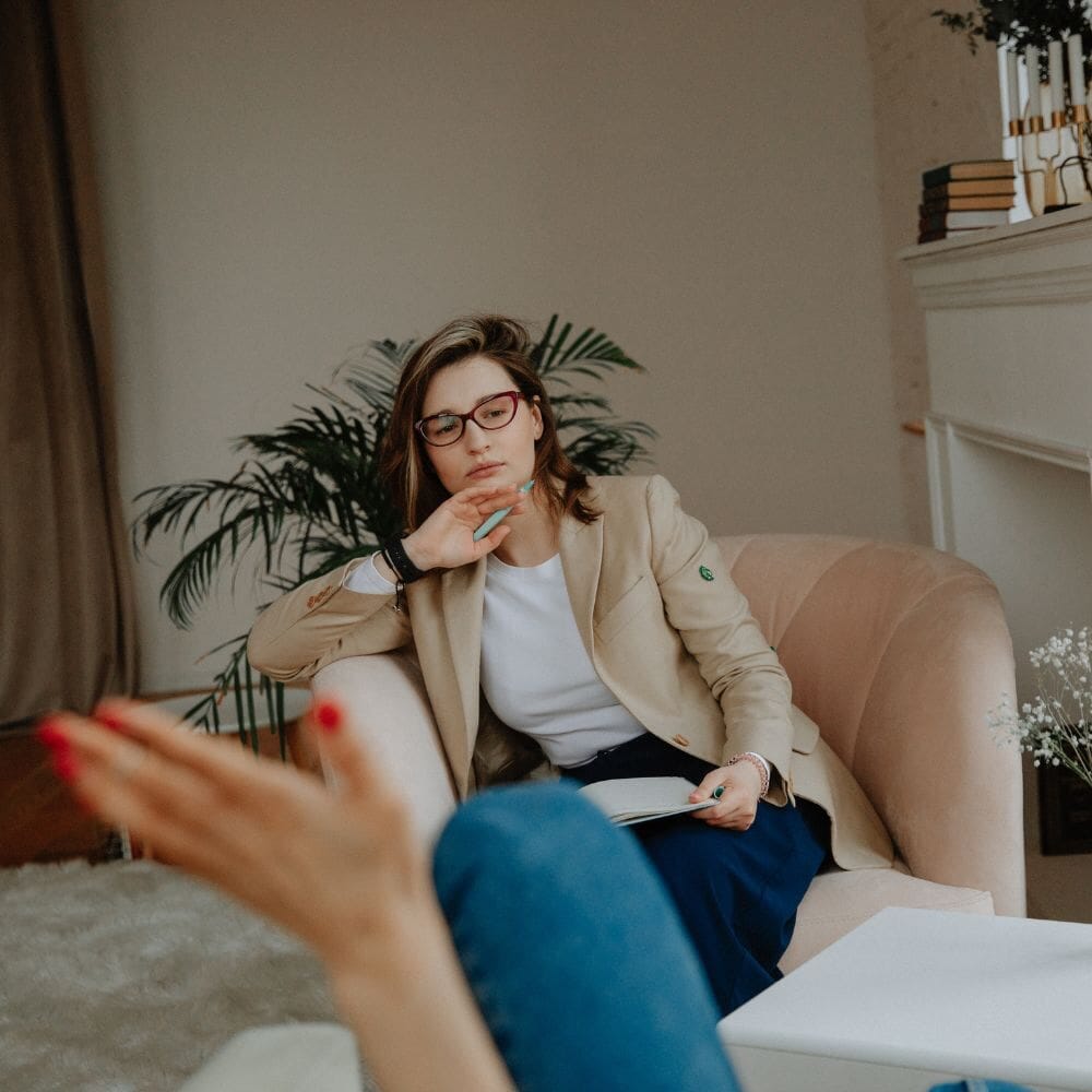 Therapist listening attentively to patient talk